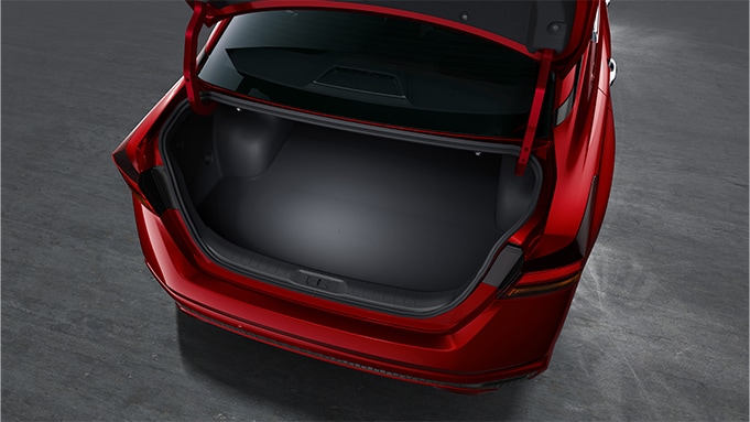 2024 Nissan Altima showing open trunk space to demonstrate cargo space 