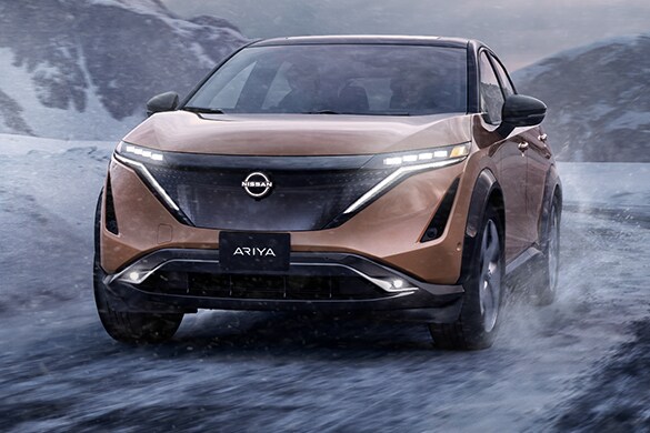 2023 Nissan Ariya on snowy road to illustrate all-wheel drive