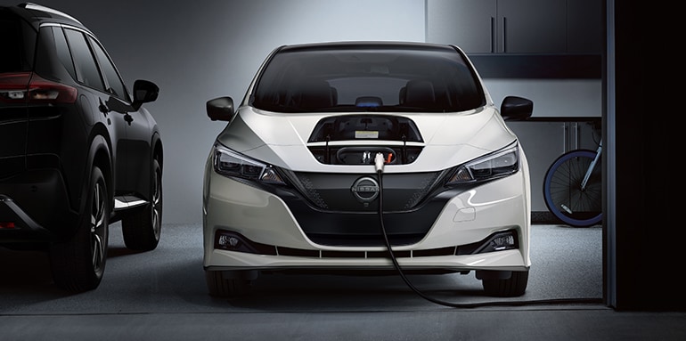 2024 Nissan LEAF charging up in a home garage