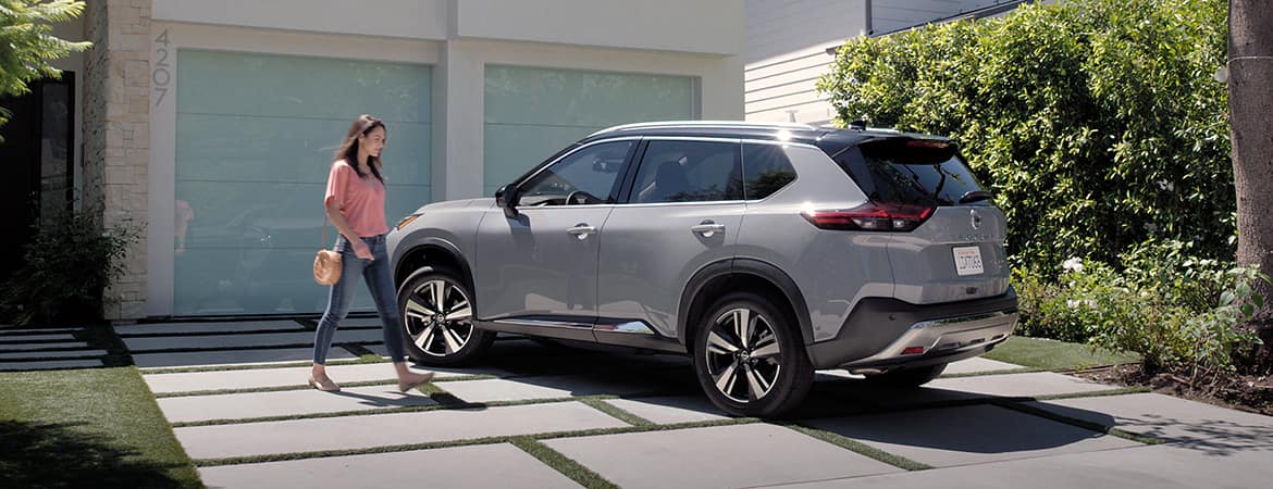 2023 Nissan Rogue person approaching Rogue in driveway, Safety Shield 360 video.