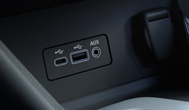 2023 Nissan Sentra showing USB-C and USB-A ports.