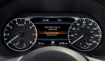 2023 Nissan Sentra showing screen displaying rear door alert.