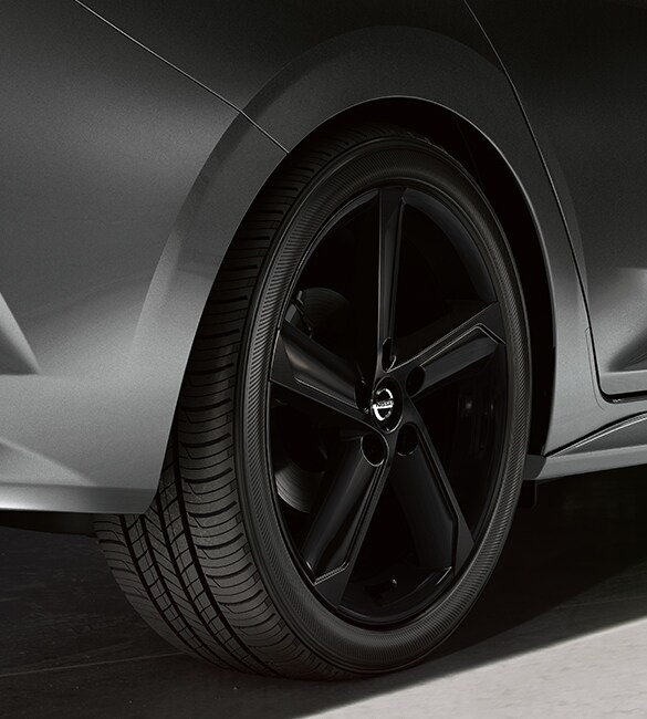 2023 Nissan Sentra 18-inch black aluminum-alloy wheels.